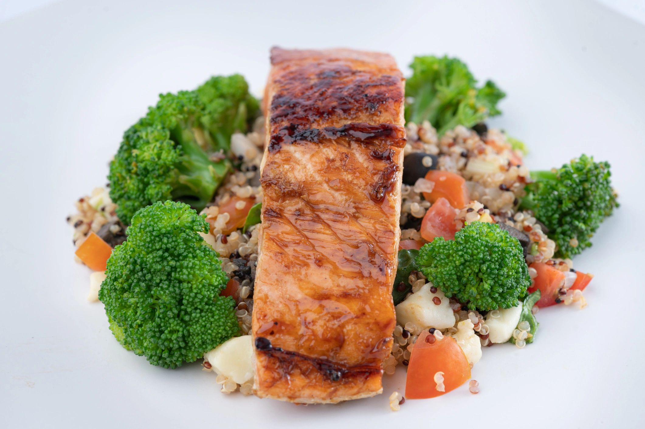 Healthy salmon, quinoa, and vegetables meal